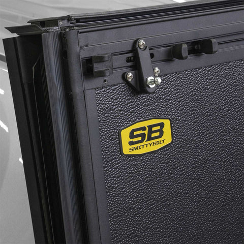 Smittybilt 2710001 - Bed Guard Folding Tonneau Cover