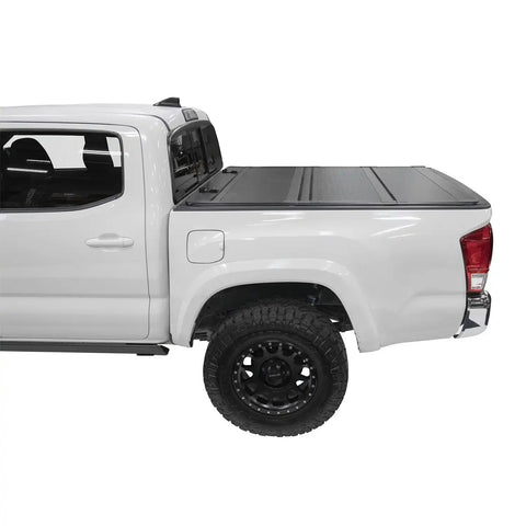 Smittybilt 2740001 - Bed Guard Folding Tonneau Cover