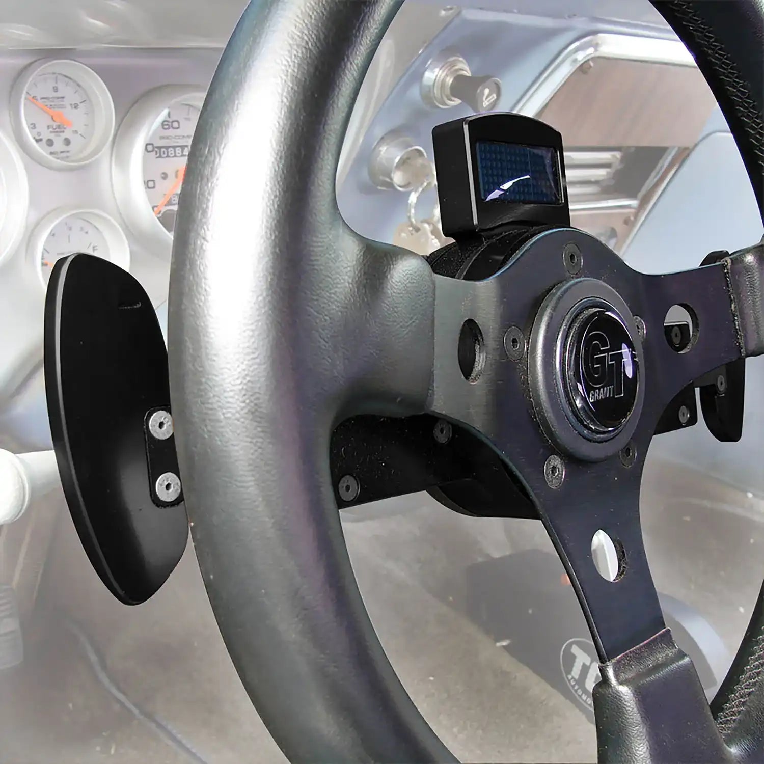 301441OnWheelInCar.jpg